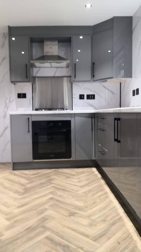 Kitchen refurbishment in Manchester with marble splashback by Renovat Construction