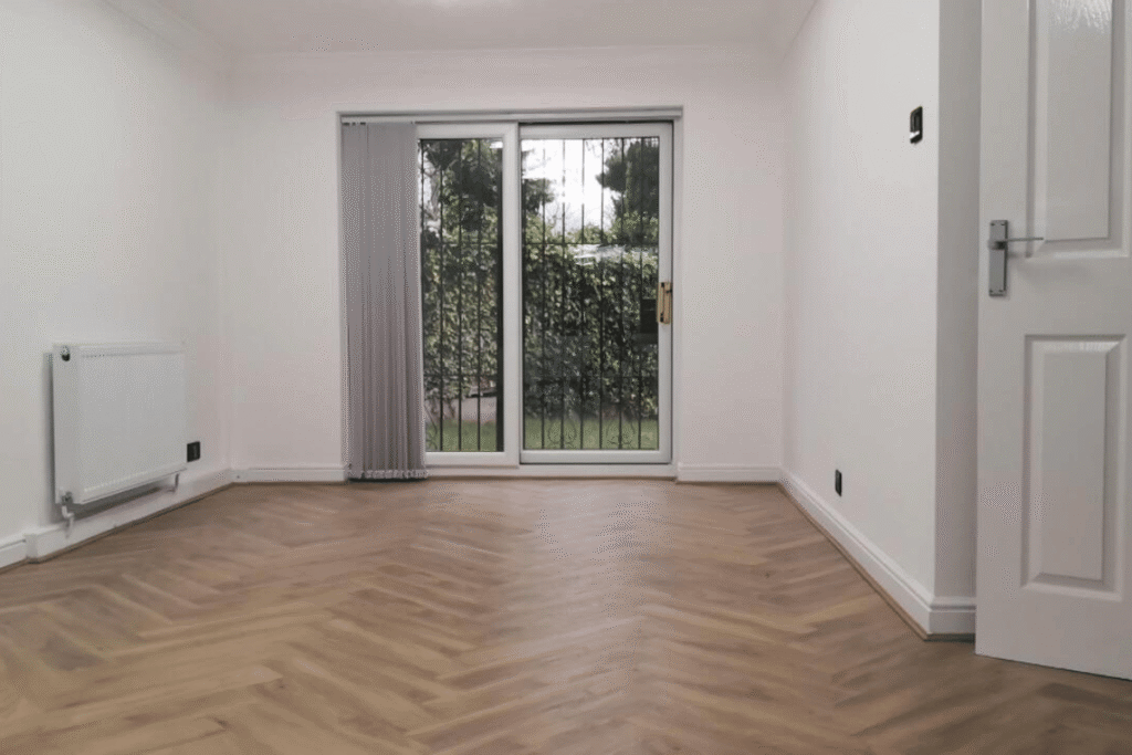 Living room renovation in Salford patio doors by Renovat Construction