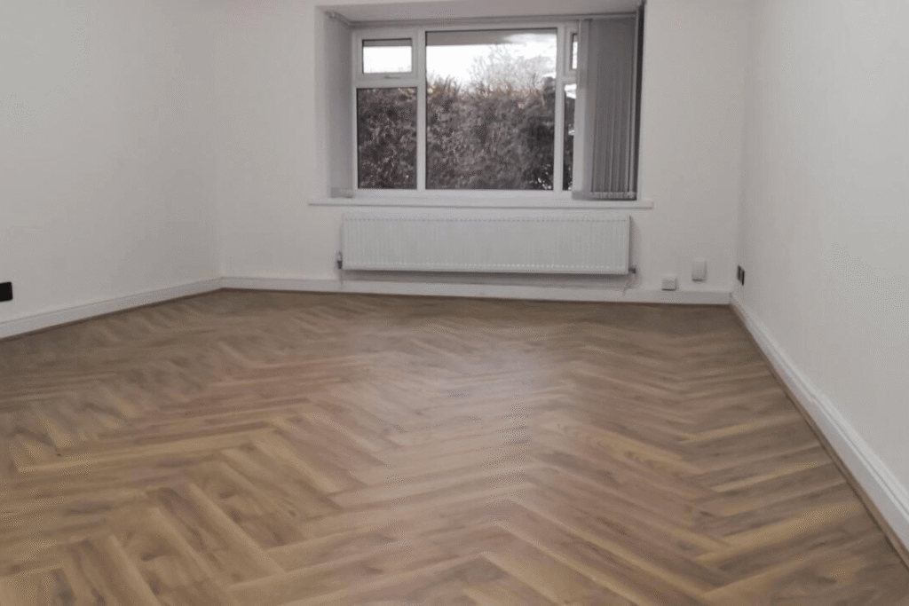 Living room renovation in Stockport herringbone flooring by Renovat Construction